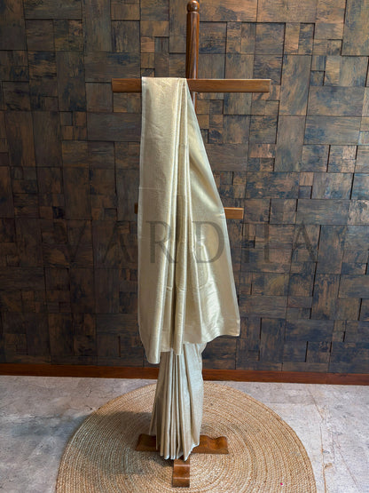Cream Viscose Tissue Silk Saree with Tone-on-Tone Zari Weave