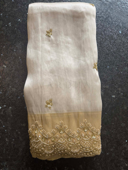 White Tissue Silk Saree with Heavy Hand Zardozi & Pearl Work