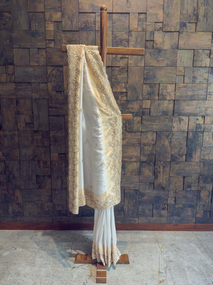 White Tissue Silk Saree with Heavy Hand Zardozi & Pearl Work