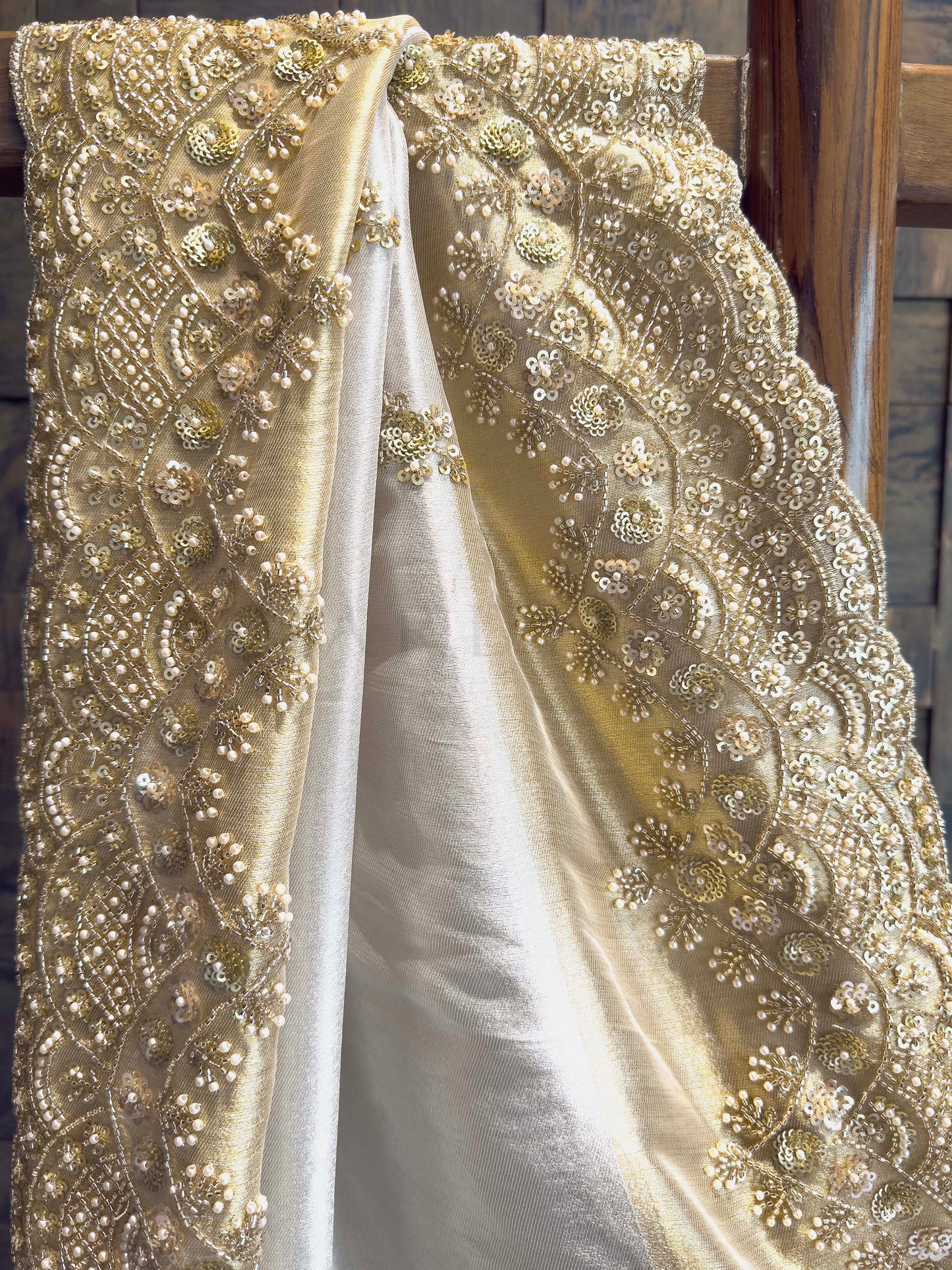 White Tissue Silk Saree with Heavy Hand Zardozi & Pearl Work