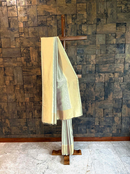 Pista Green Viscose Kanjivaram Tissue Silk Saree with Gold Zari Border